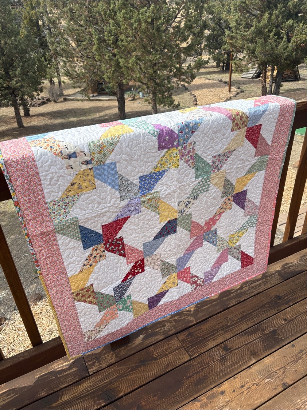 Handmade Lap / Baby Quilt in 30s print fabric. Hand-sewn binding. 42 by 52.5 inc